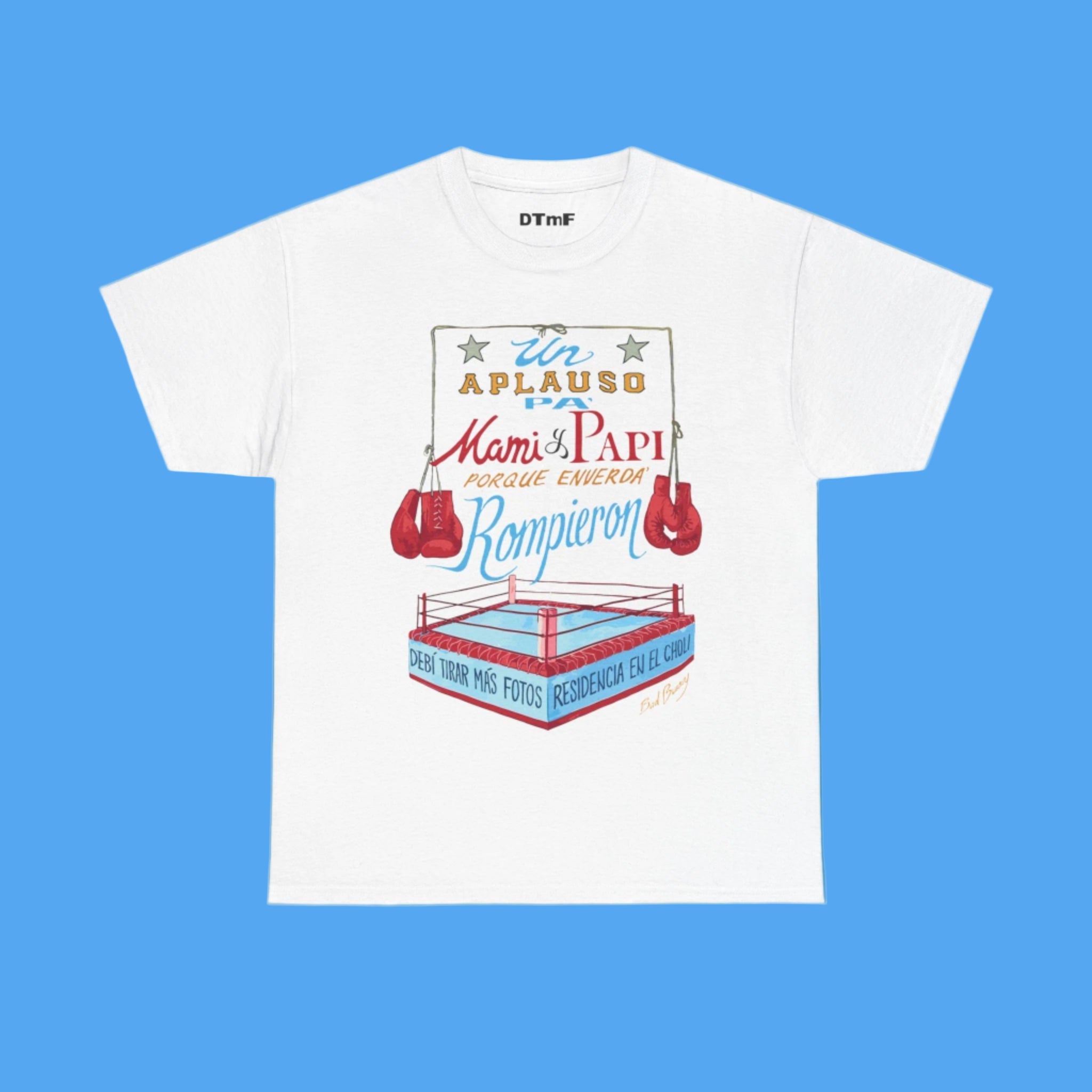 White t-shirt with boxing-themed graphic and text on a blue background