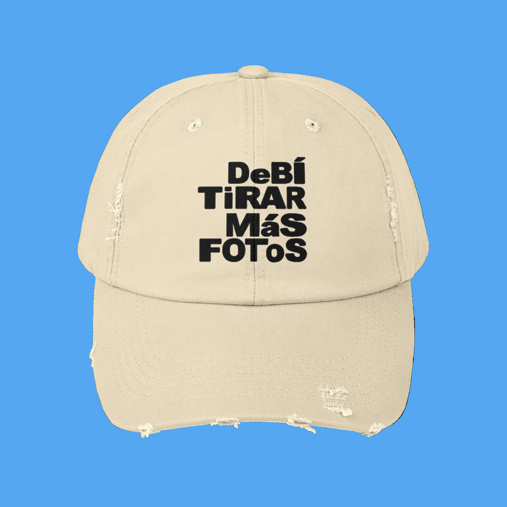 Beige cap with black text on a white background