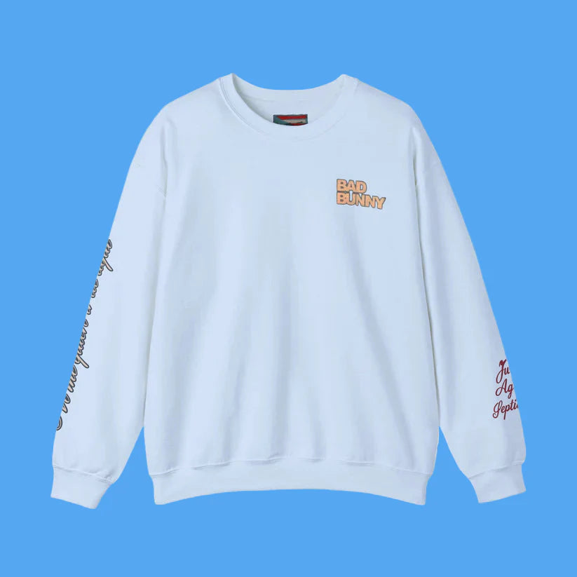 White sweatshirt with 'Bad Bunny' branding on a blue background