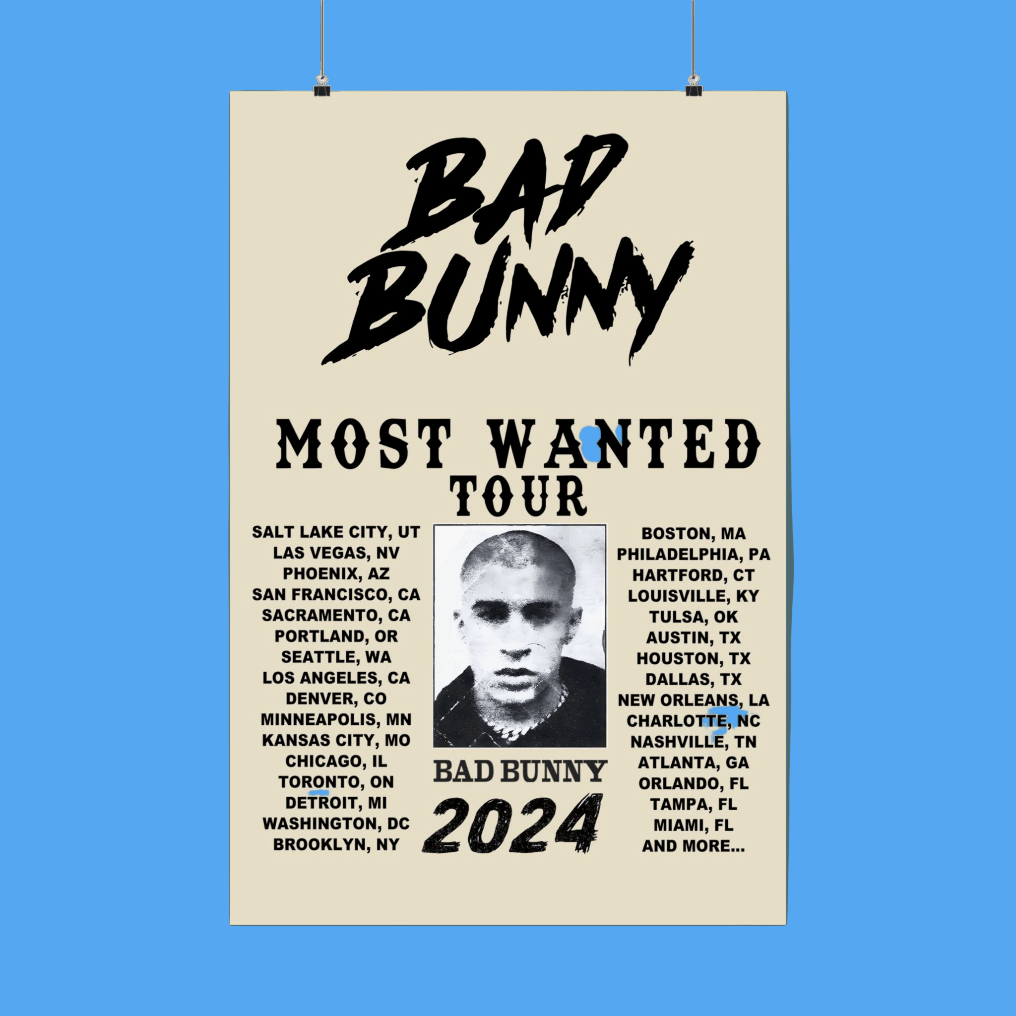 Poster for Bad Bunny's 'Most Wanted Tour' with tour dates and a photo of the artist on a beige background.