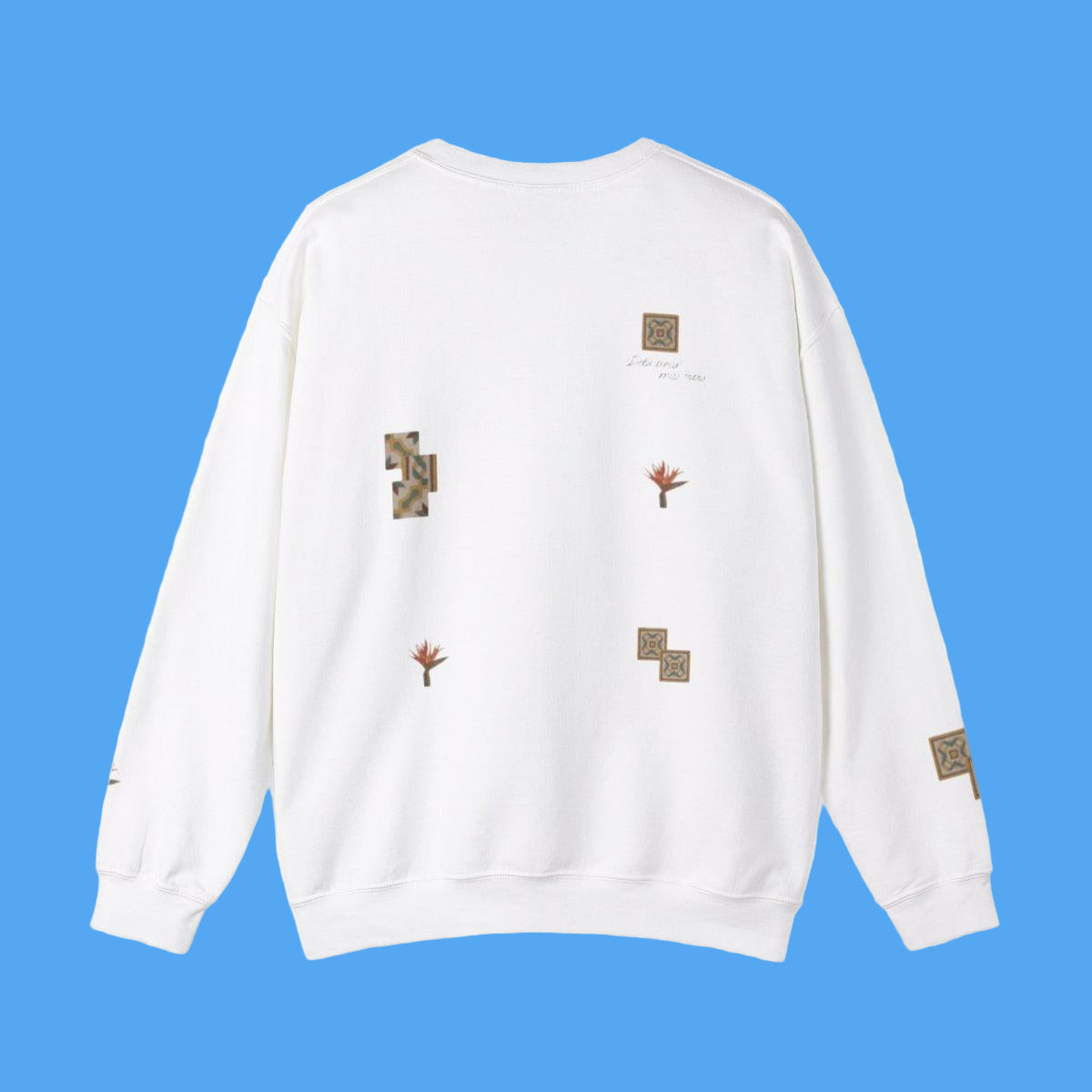 White sweatshirt with various patches on a white background