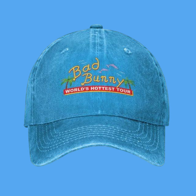 Blue cap with 'Bad Bunny World's Hottest Tour' text on a white background